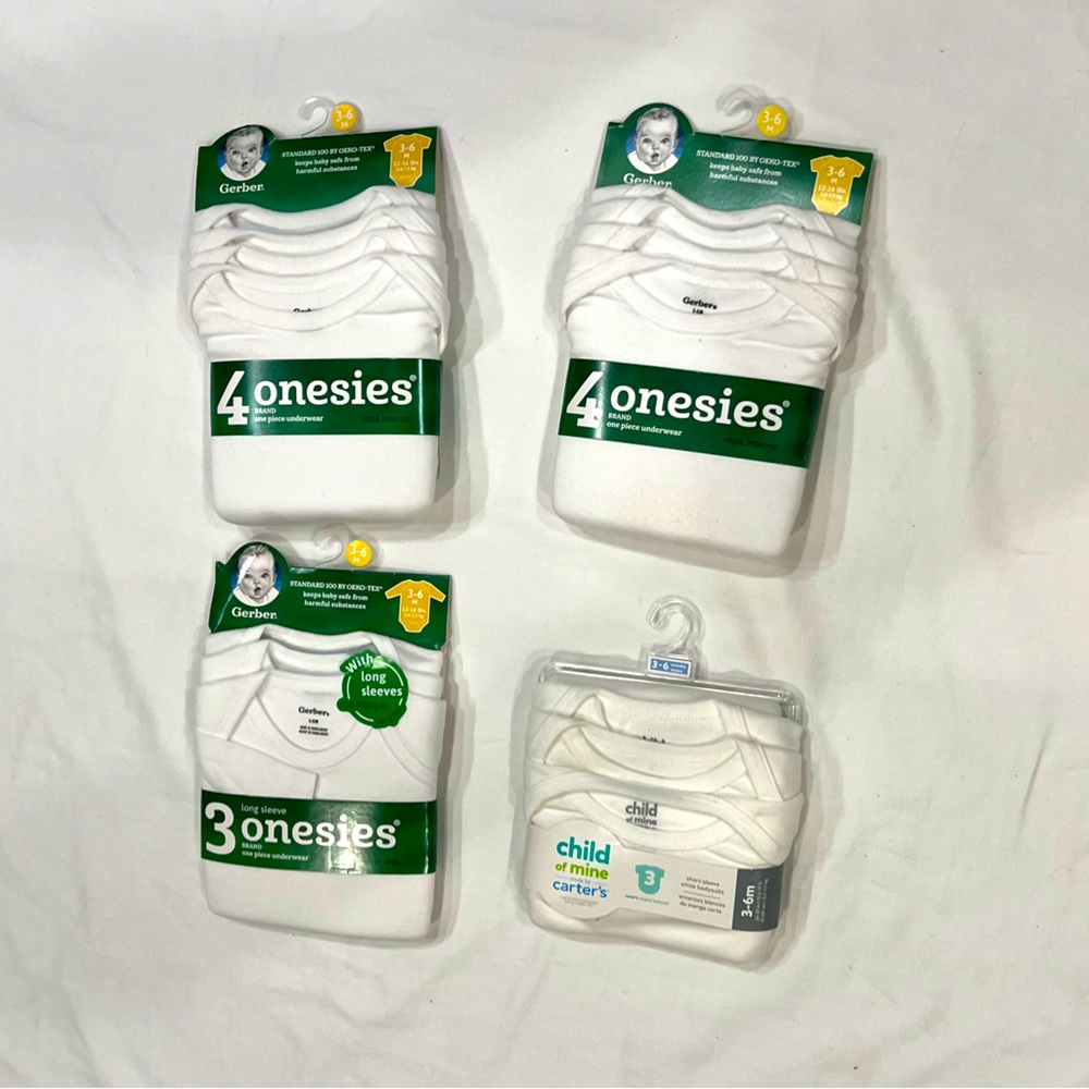 14 white onesies; 3 to 6 month; 11 short-sleeved and 3 long sleeved.